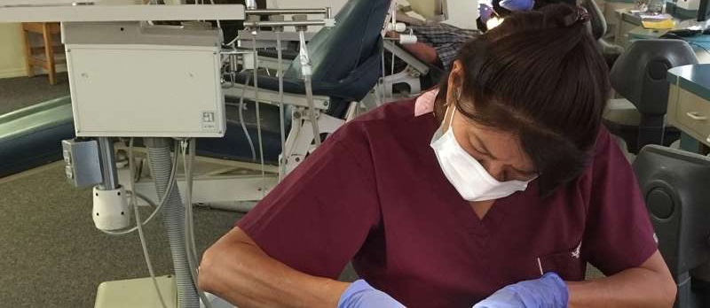 A dental assistant working in our clinic.